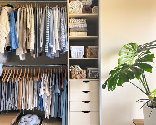 Concept of decluttering, organizing and tidiness in closet. Storage for apparel, socks and shirts, copy space